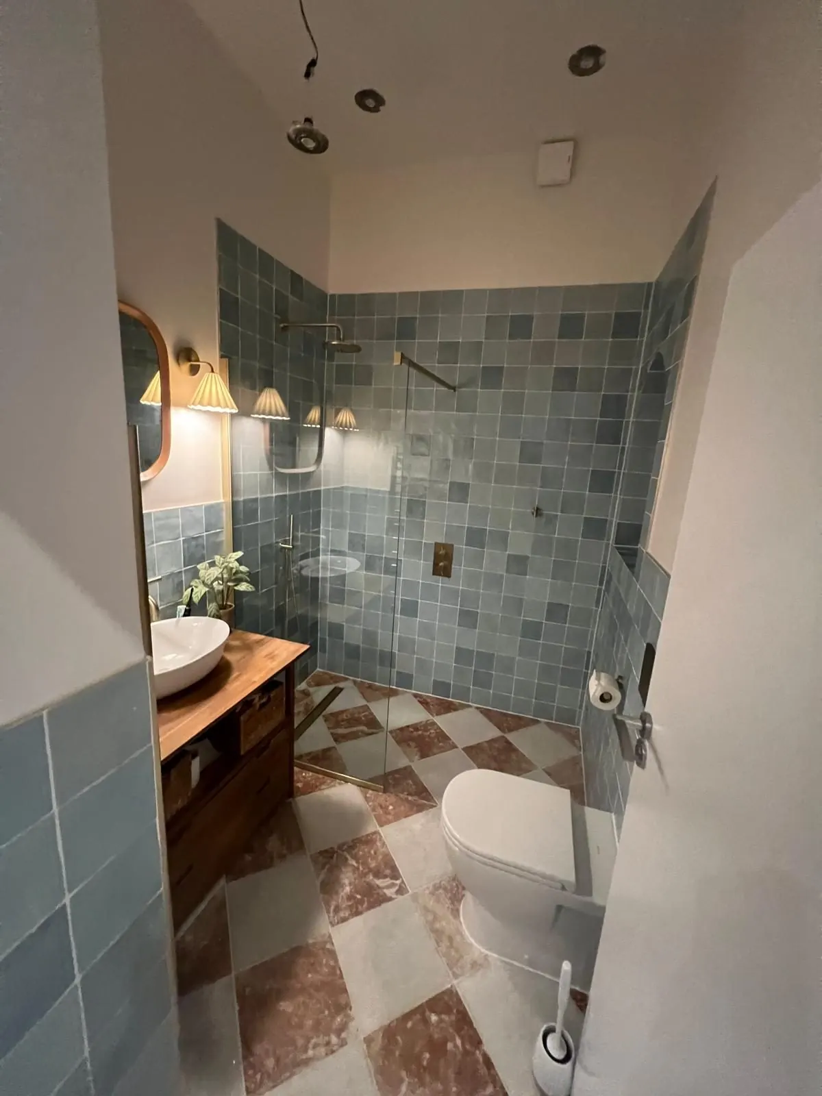 Shower tiling and niche by SFB Interior Refurbishment Ltd