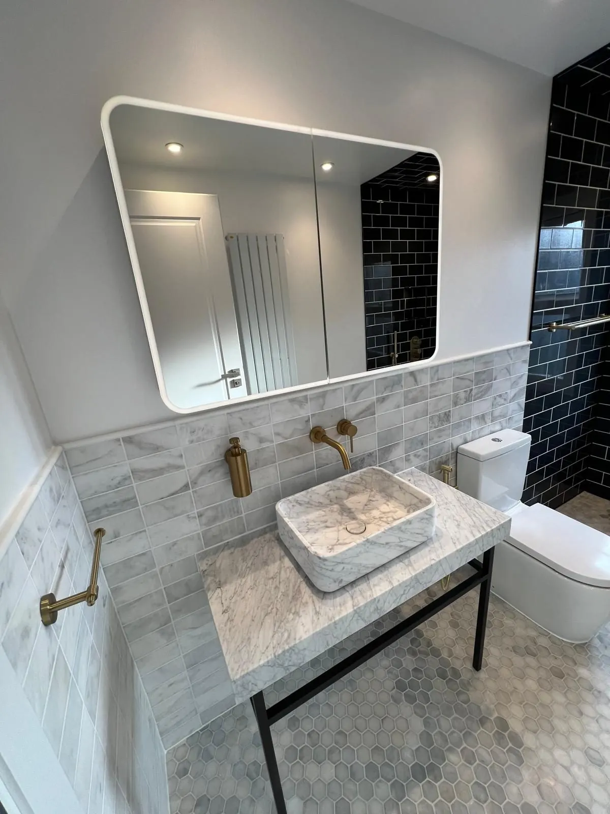 Bathroom vanity and tiling by SFB Interior Refurbishment Ltd