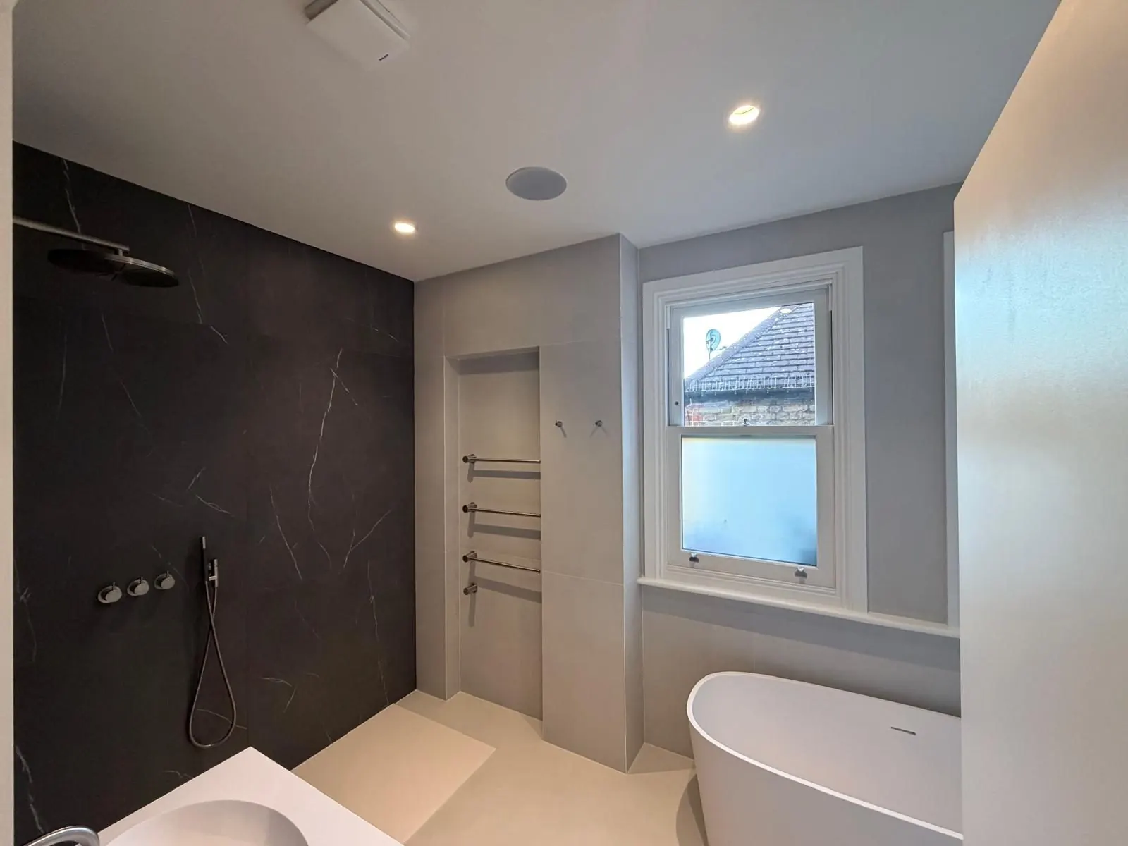 Bathroom WC and basin finish by SFB Interior Refurbishment Ltd